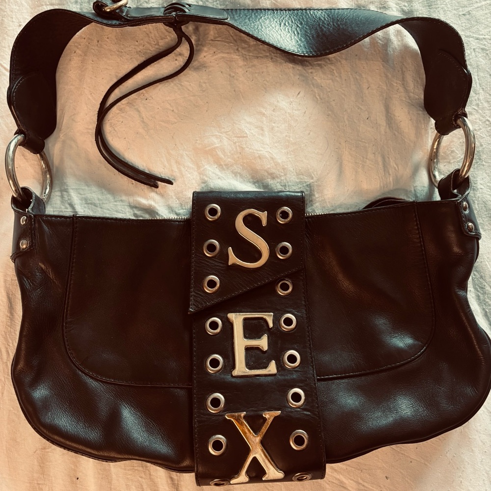 Iconic 2003 spring D & G Runway handbag
Black with large "SEX" on the front.